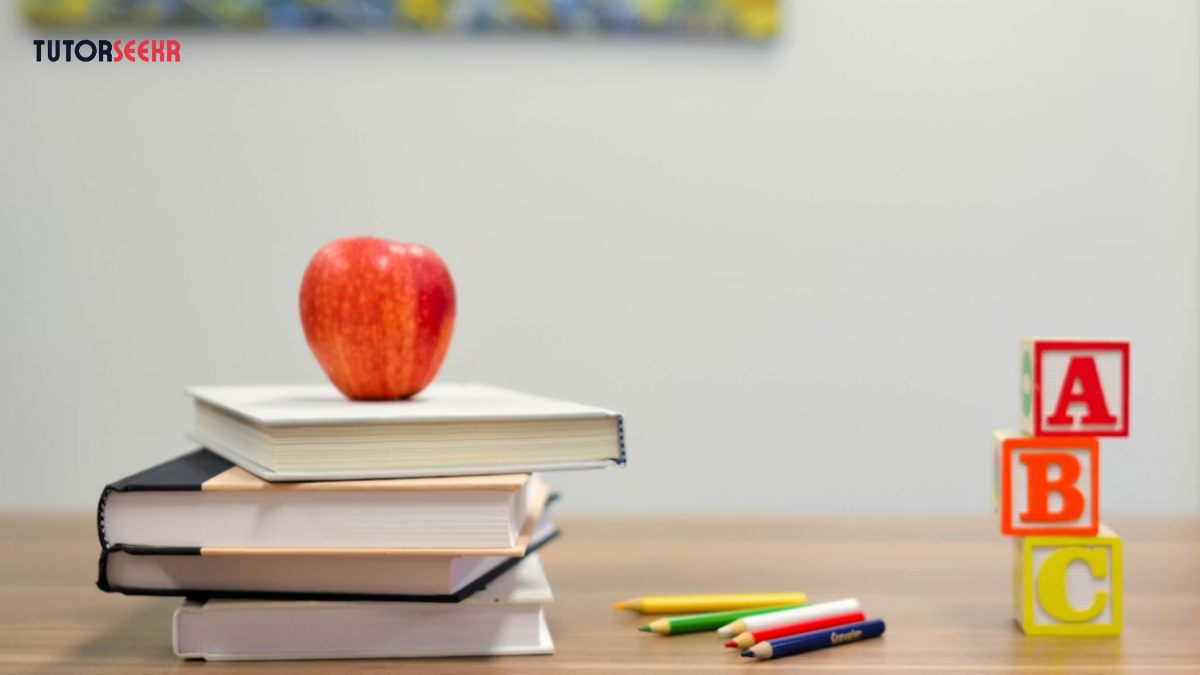 How to Choose the Right Tuition Centre in Vasai-Virar Educational mateiral along with books and pencils and an apple, on a desk
